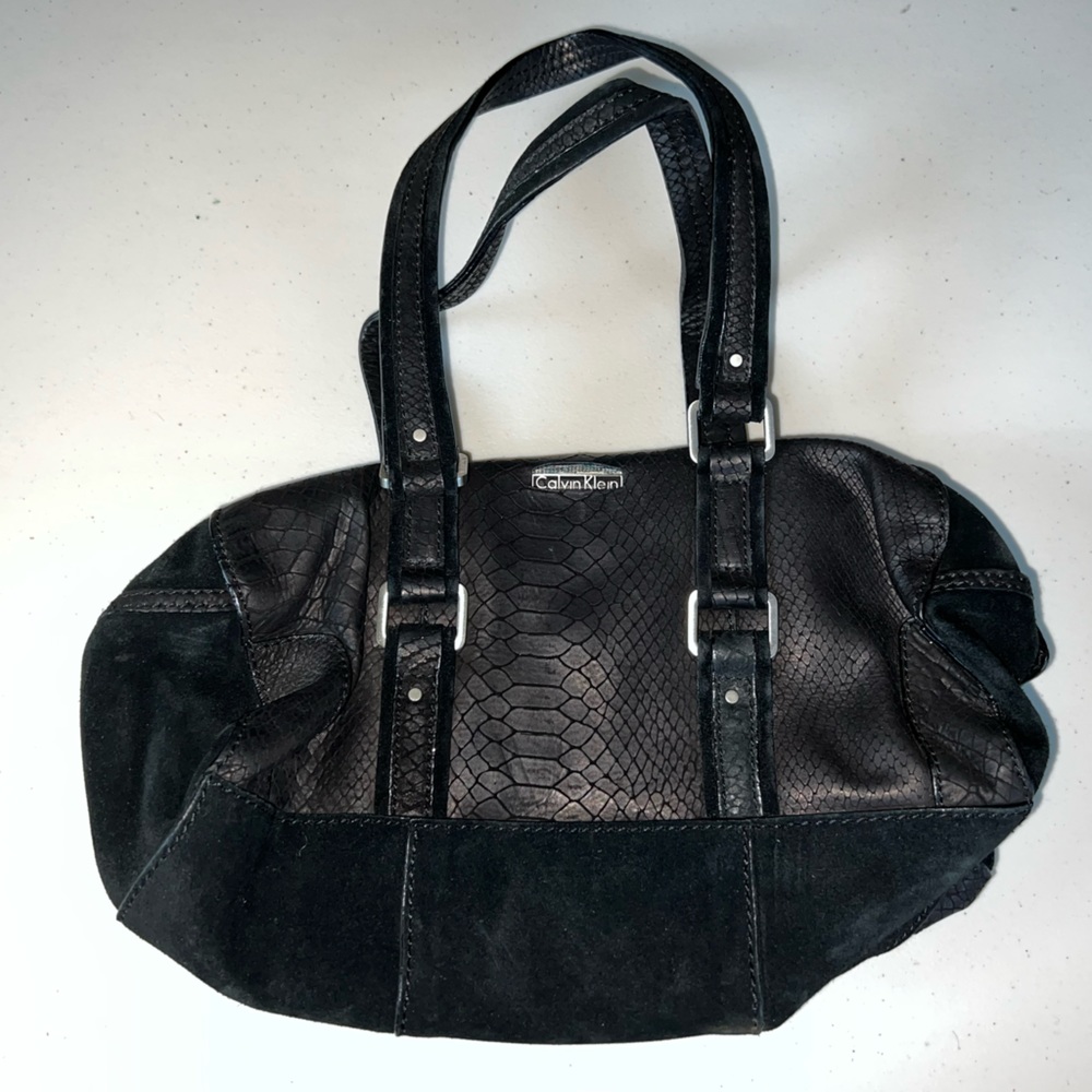 Calvin Klein black mini duffle shaped shoulder bag